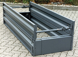 Verbausystem 'Hessen-Serie' zur Verschalung von Gräbern mit einer tiefe bis zu 3 m. Das System trägt das GS-Zeichen und wurde durch die Prüf- und Zertifizierungsstelle geprüft.